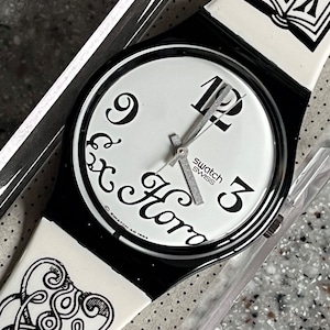 NEW vintage 1995 Swatch Watch 34mm Original Black Letter GB163 never worn with battery in box running free shipping in the USA