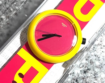 NEW pop swatch watch larger, face POP orange black attractive watch in box with cardboard sleeve running with a new battery