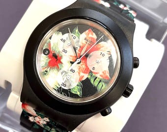 Wunderschöne Swatch Uhr Flower Breeze svcf4002 Diaphane Irony Neu In Box nie getragen Chrono Unisex Edelstahl Zierband mit Batterie