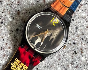 James Bond Swatch watch 34mm 1974 The Man With the Golden Gun pre-owned swatch 007 no box with battery running