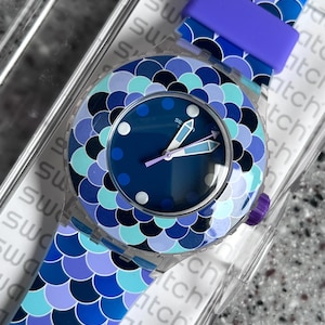 Swatch Watch Scuba PEDRINHA AZUL SUUK110 Skeleton Blue And Purple Watch unworn new in box with battery working well