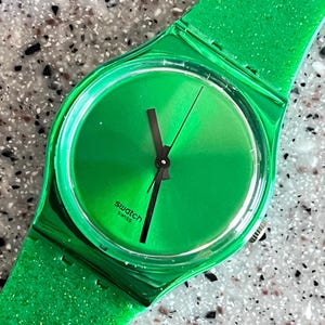 Swatch Watch unworn in box with battery GREEN glittery perfect Wicked, St Patty&#39;s Day Irish swatch watch flexible band 34mm face great watch