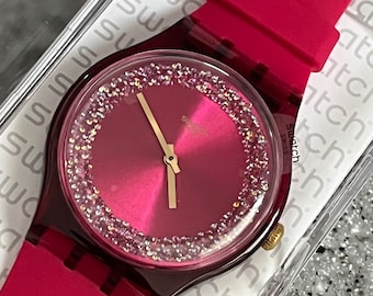 Ruby Rings Swatch Uhr NEU nie in Box mit Batterie getragen, schöne auffallende rosa Farbe mit Kristallen 41mm Swatch Silikonband
