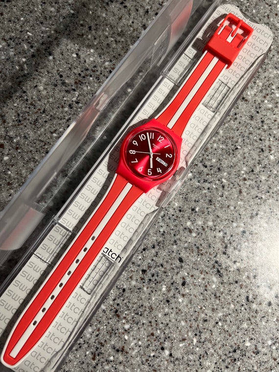 Swatch Watch date/time swiss quartz feature 34mm face… Gem