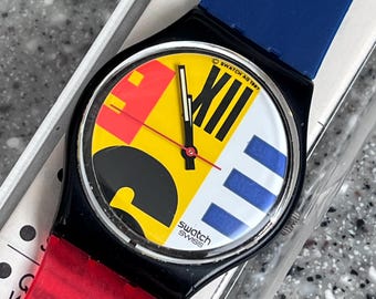 Vintage Swatch 34mm face pre owned little wear in box with battery from 1987 very rare in good condition running replacement era bands