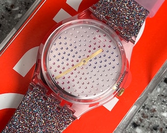Swatch Watch NWT in box glittery everyday swatch never worn with battery called Multilumino great 34mm face silicone band pink glittery!