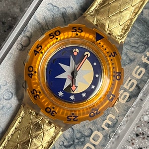 Vintage Scuba Swatch Watch 91-92 Golden Island SDK211 model NEW condition running in box with battery leather gold strap 38mm case great!