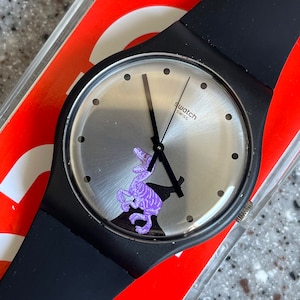 Swatch Watch Dinosaur called Pinkosaure New Old Stock never worn 41mm newer size running with battery Jurassic Park theme Disney silicone