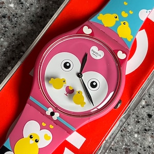 NEW fabulous FUN spring/summer Swatch Watch with birds and hearts love of the outdoors with battery in box never worn working well 41mm