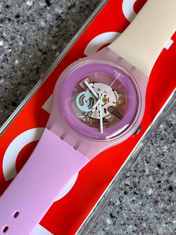 Swatch Watch 41mm dial SUOP101 Sweet Me silicone band in box New old stock never worn and running pink cream skeleton transparent dial