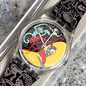 Swatch Watch Vintage Jungle Tangle GK234 NEVER worn in the original box with a battery fun graphic swatch watch with jungle animals 34mm