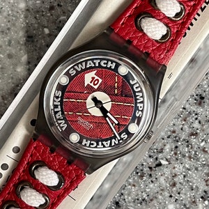 Vintage Swatch 1994 GM131 Athletics Never Worn in box with battery and running leather band 34mm face great unique RARE watch