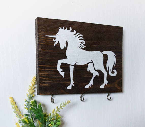 wooden unicorn storage rack