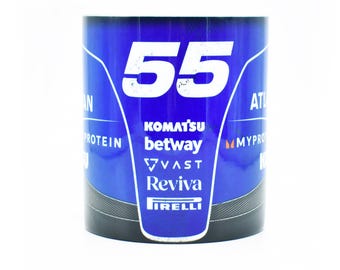 May include: A blue and black ceramic mug with a white number 55 on the front. The mug has several sponsor logos including Komatsu, Betway, Vast, Reviva, and Pirelli.