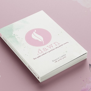 May include: A white book with a pink circle on the cover. The circle contains a white feather design. The book title is "dawn" and the text reads "Your guided workbook & journal for setting healthier boundaries". The author is Eleanor Loseby with special guests.