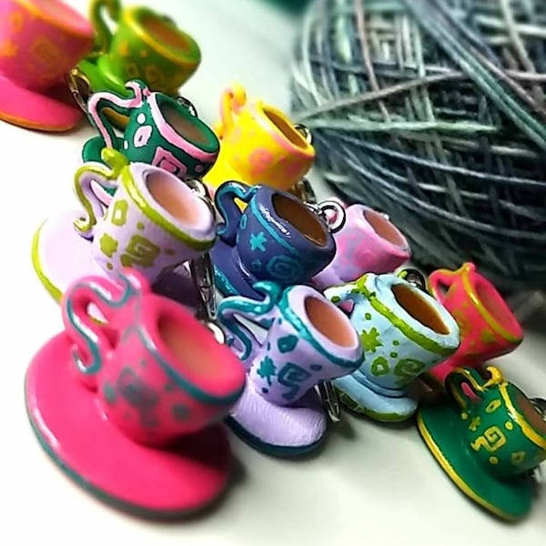Mad hatter tea party charm progress keeper