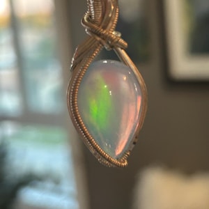 Created Aurora Opal set in Sterling Silver