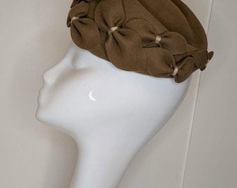 Warm caramel wool Jackie Kennedy Pillbox Hat: Handblocked with bow detail.