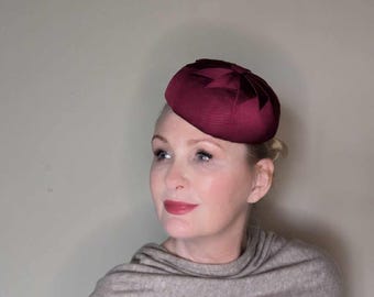Burgundy pillbox button hat. Vintage style cocktail hat.