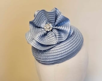 Beautiful pale blue button hat.