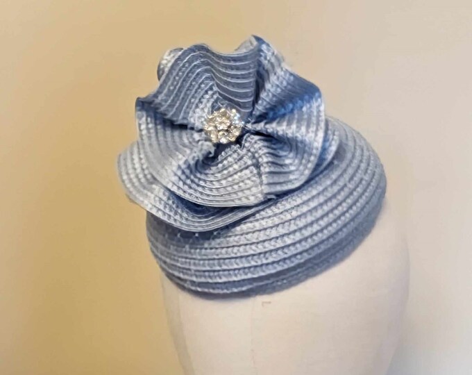 Beautiful pale blue button hat.