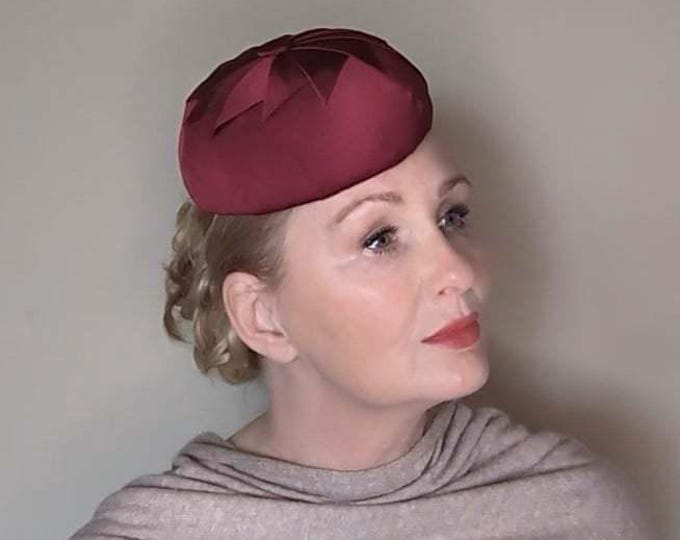 Burgundy pillbox button hat. Vintage style cocktail hat.