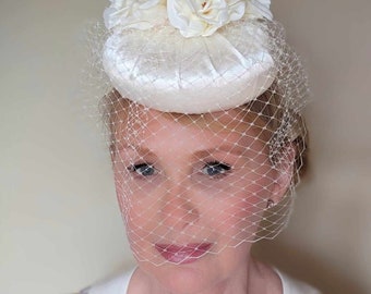 Beautiful bridal pillbox hat, duchess satin, millinery veiling, silk flowers