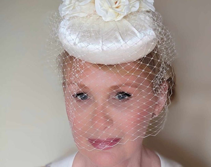 Beautiful bridal pillbox hat, duchess satin, millinery veiling, silk flowers