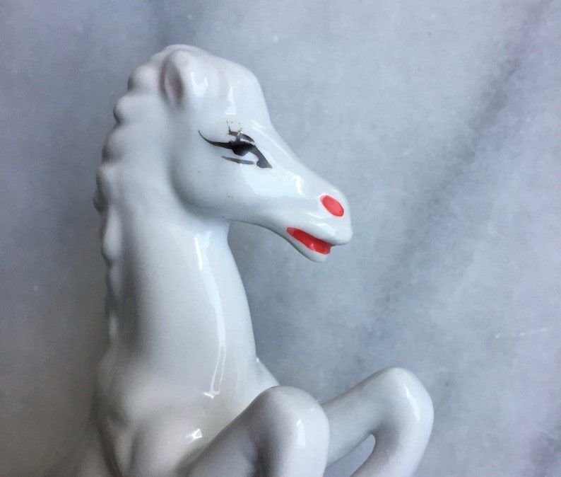 white porcelain horse statue