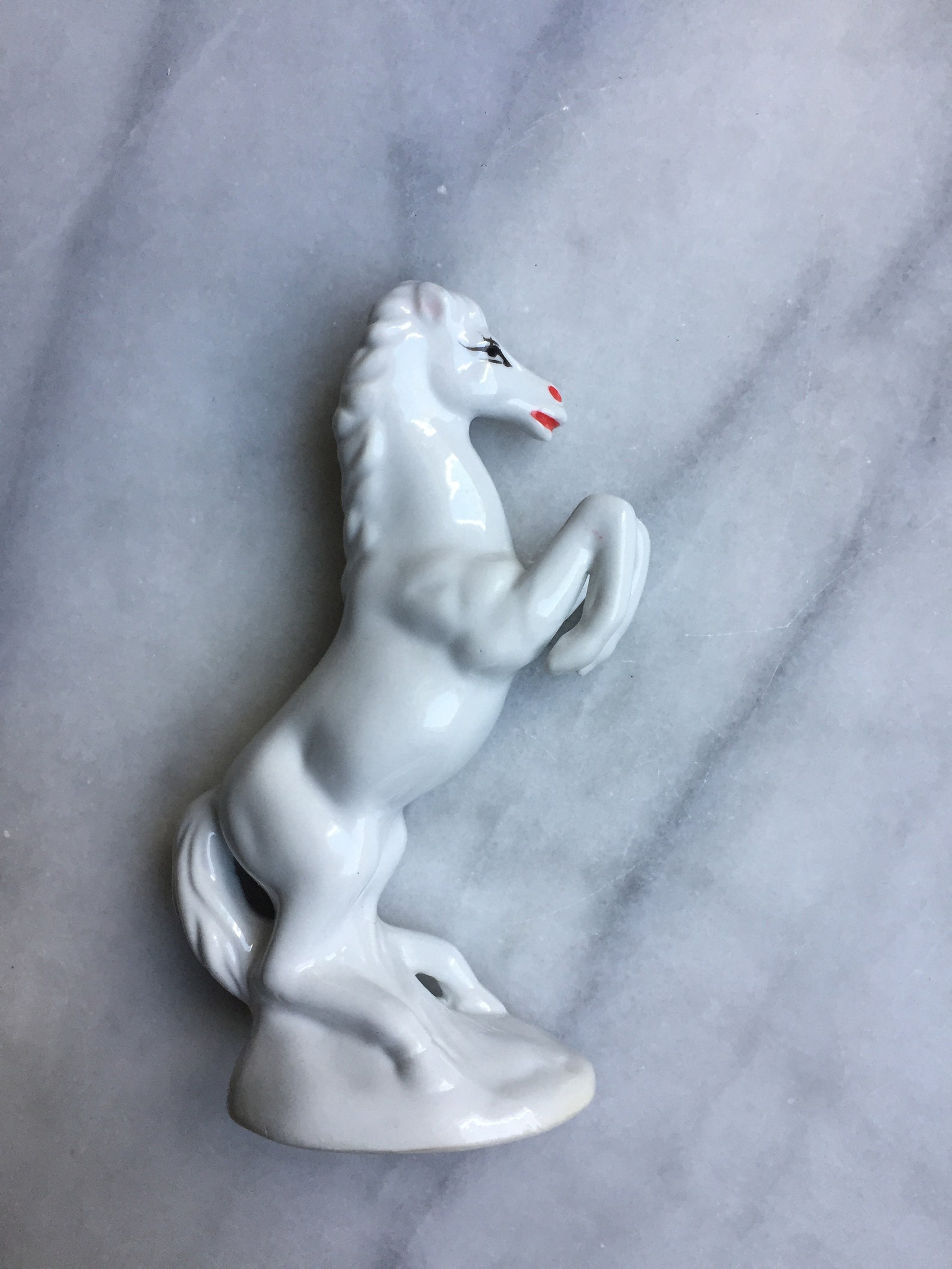 white porcelain horse statue