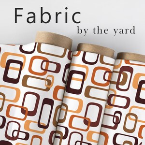 May include: Fabric rolls with a retro geometric pattern in shades of brown, orange, and white. The fabric features a repeating design of rounded rectangles. Text at the top reads "Fabric by the yard".