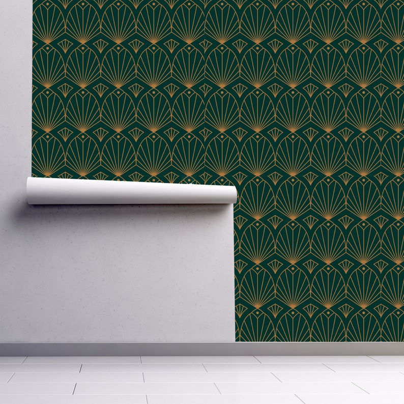 Black and gold antique Art Deco geometric fabric peel and stick wallpaper on wall partially rolled up