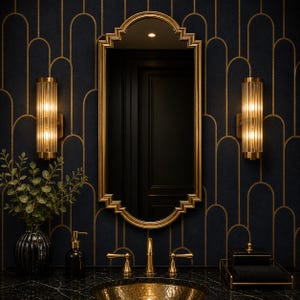 May include: A luxurious bathroom scene featuring a gold-framed mirror, gold fixtures, and sconces. The dark blue walls have a gold art deco pattern. A black marble countertop holds a gold sink, soap dispenser, and a black tray with a towel.