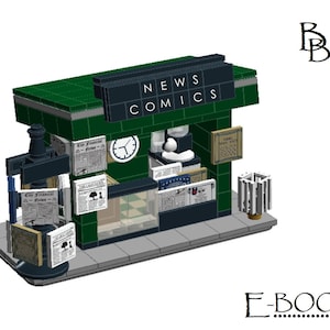 以下が含まれることがあります： 「NEWS COMICS」の文字が書かれた緑とグレーのレゴの新聞スタンドモデル。モデルには新聞ディスプレイ、時計、小さな内部が含まれています。Brick Beeのロゴは右上にあります。