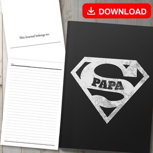 May include: Black journal with a white Superman logo that says "Papa" inside the "S". The journal has a blank page for writing "This journal belongs to:" and lined pages for writing.