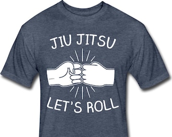 May include: A dark blue t-shirt with white text that reads "Jiu Jitsu Let's Roll". The text is accompanied by a graphic of two fists bumping together.