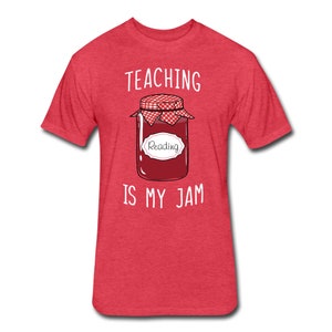 May include: Red t-shirt with the text "TEACHING IS MY JAM" and a cartoon image of a jar of jam with a red lid and a white label that says "Reading".