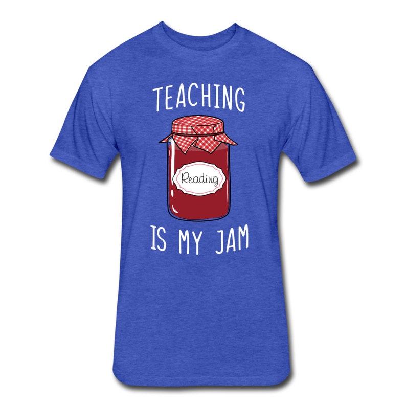 May include: A royal blue t-shirt with the text "TEACHING IS MY JAM" in white. A cartoon image of a jar of jam with a red lid and a white label that says "Reading" is in the centre of the shirt.