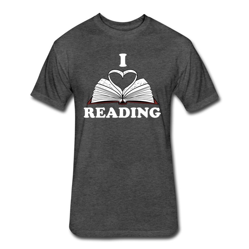 May include: A dark heather grey t-shirt with a white graphic of an open book with a heart shape formed by the pages. The text "I love reading" is printed below the book.