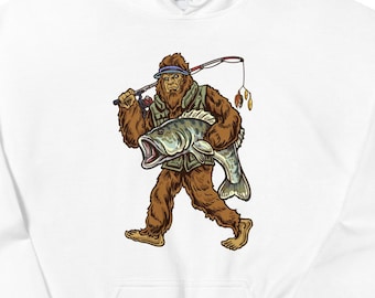 Può includere: Felpa con cappuccio bianca con una grafica di un Bigfoot che tiene un pesce e una canna da pesca. Il Bigfoot indossa una fascia blu e un gilet verde.