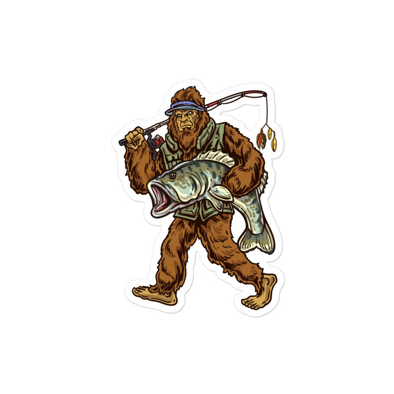 May include: A cartoon illustration of a Bigfoot wearing a fishing hat and holding a large fish. The Bigfoot is wearing a green vest and brown pants. The fish is green and brown with a white mouth.