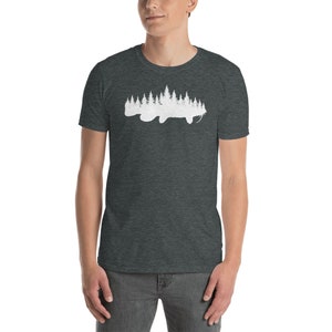 May include: A dark heather grey t-shirt with a white silhouette of a fish made up of trees.