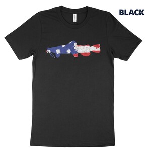 May include: Black t-shirt with a silhouette of a catfish in the shape of the American flag.