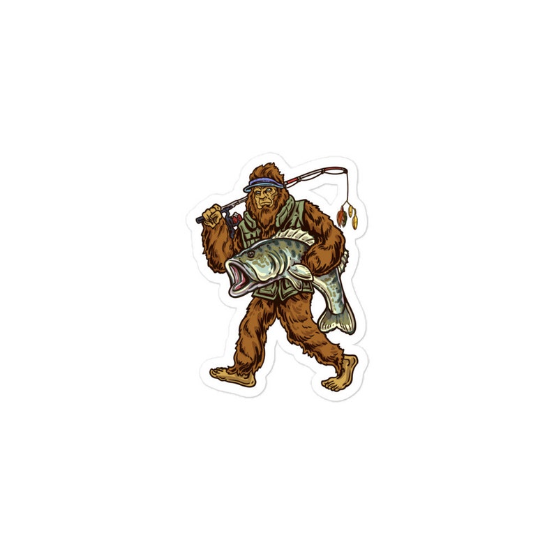 May include: A cartoon illustration of a Bigfoot holding a large fish. He is wearing a green vest and a blue baseball cap. He is holding a fishing rod in his other hand.