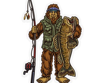 May include: A sticker featuring a cartoon Bigfoot character holding a fishing rod and a large fish. The Bigfoot is brown and wearing a green vest and blue visor. The fish is brown with dark spots. The fishing rod is black and red.