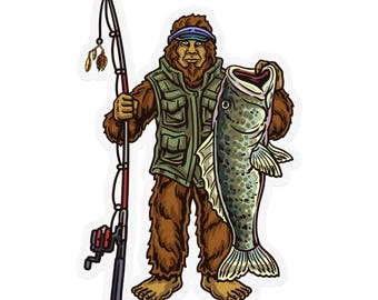 May include: A sticker featuring a cartoon Bigfoot character holding a fishing rod and a large fish. The Bigfoot is brown and wearing a green vest and blue visor. The fish is gray with black spots.