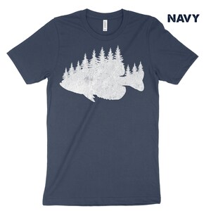 May include: A navy blue t-shirt with a white silhouette of a fish made up of trees.