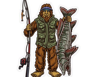 Może przedstawiać: Naklejka przedstawiająca kreskówkowego Bigfoota trzymającego wędkę i dużą rybę. Bigfoot ma na sobie zieloną kamizelkę i niebieski daszek. Ryba ma czerwone płetwy i prążkowane ciało.