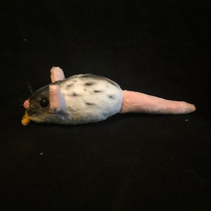 Toothy rat plushie