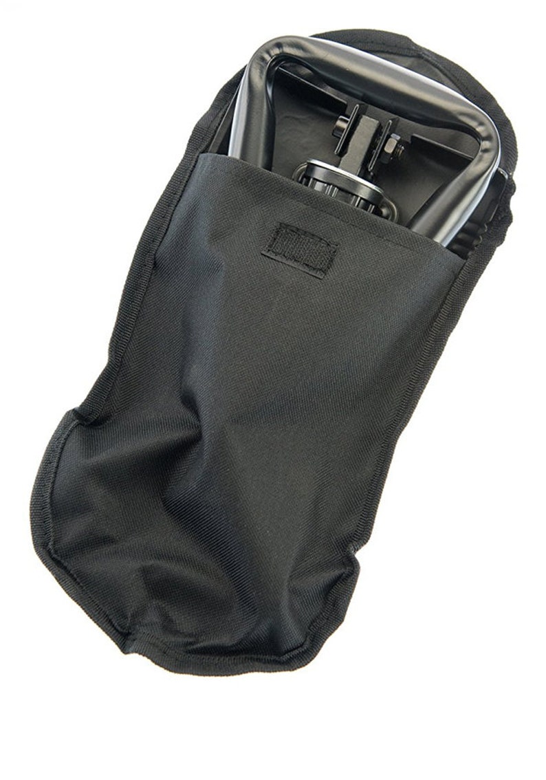 May include: A black folding chair with a carrying case. The chair is folded and stored in the case.